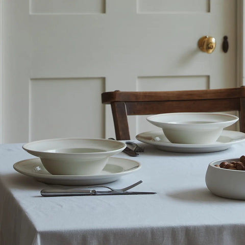 Inku Dinnerware by Sergio Herman, Mepra Flatware, Libeco table linens table settings