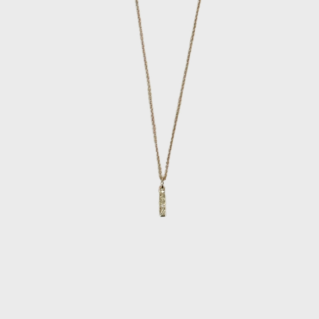 14k baby bar diamond necklace Aili designed by Monica Ruzansky