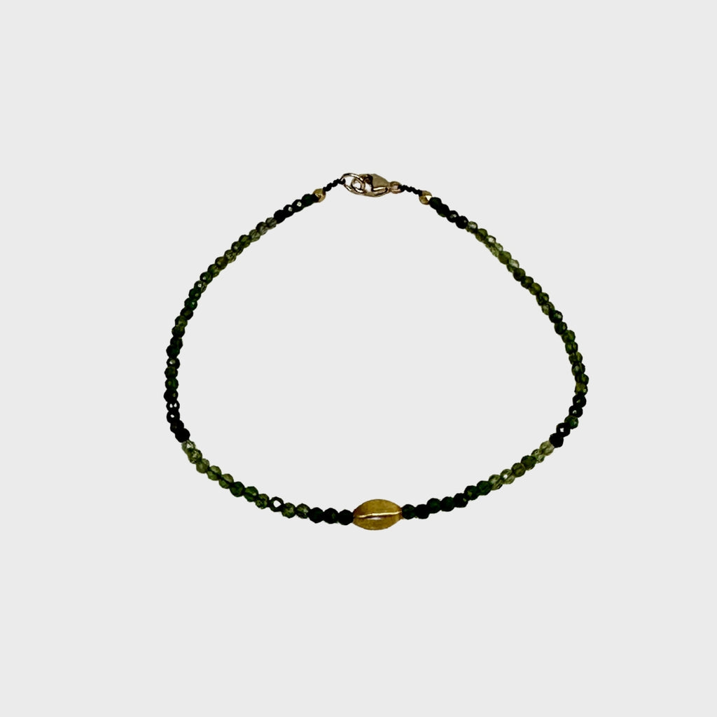 Green tourmaline bracelet with single gold bead and clasp