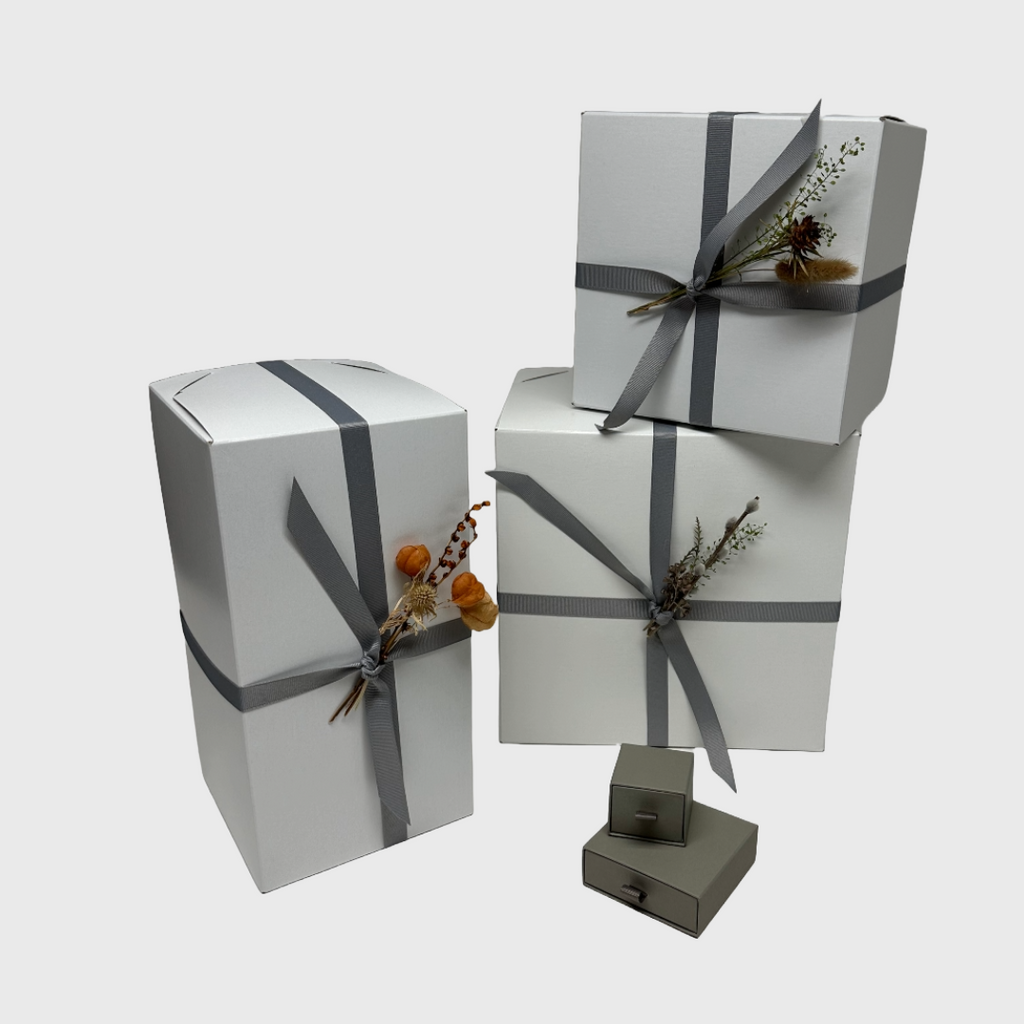 Gift Wrap gros grain ribbon and dries over white box