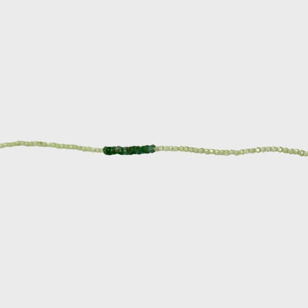 Peridot and emerald beaded bracelet with silver clasp