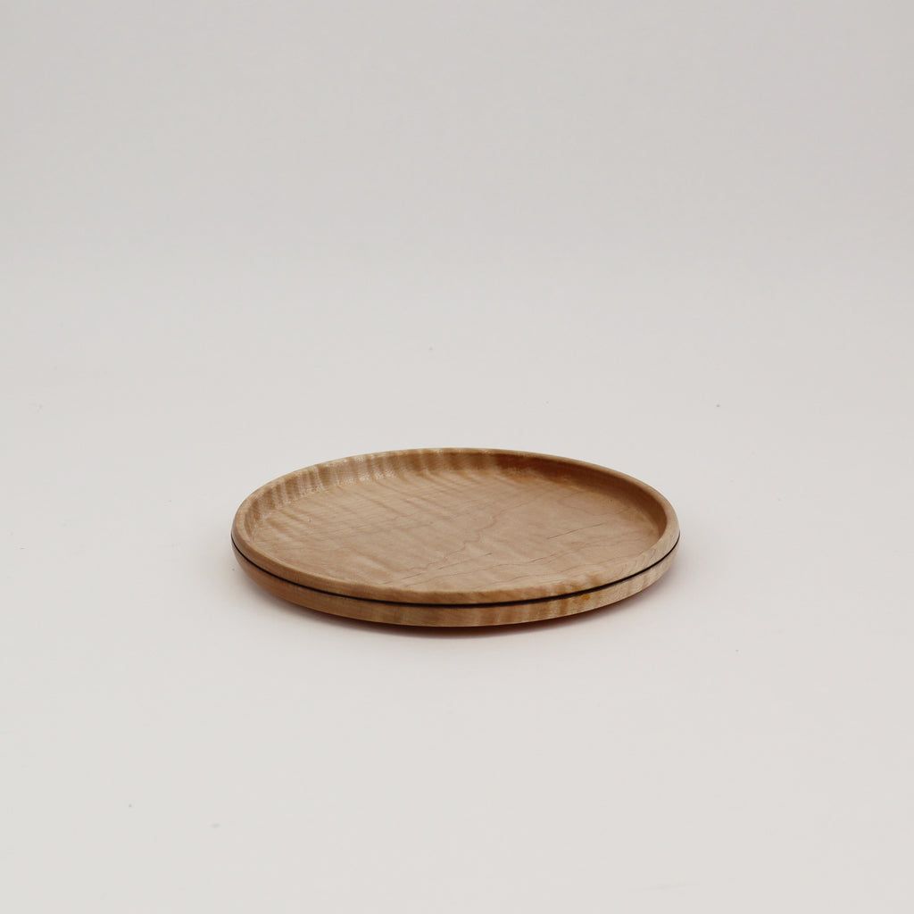 Small maple tray catchall for personal essentials. 