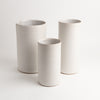 tracie hervey tall slim cylinder vases glazed white pottery ceramics handmade in queens