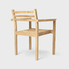 AH502 Outdoor Dining Chair with Armrest, FSC™-certified teak, untreated, Designed by Alfred Homann for Carl Hansen & Søn