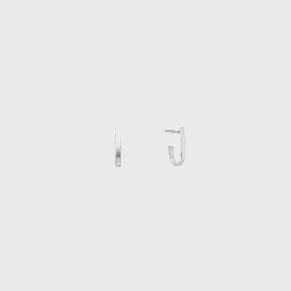 sterling silver earring shaped like a letter J  from to back handmade NYC Sarah Macfadde 