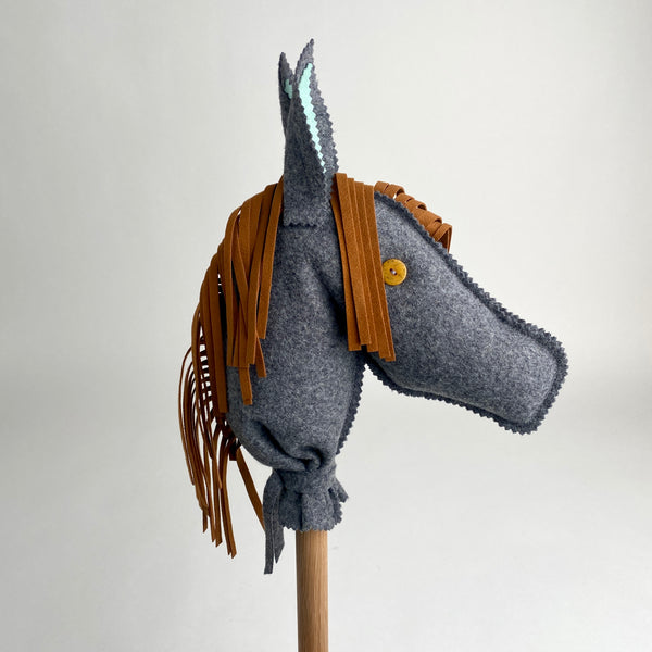 Handmade felt hobby horse made by Eileen Ley