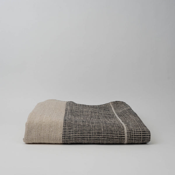 Neem Nyasa Throw blanket hand-woven and hand-spun with soft cotton yarns in India black and white made in india