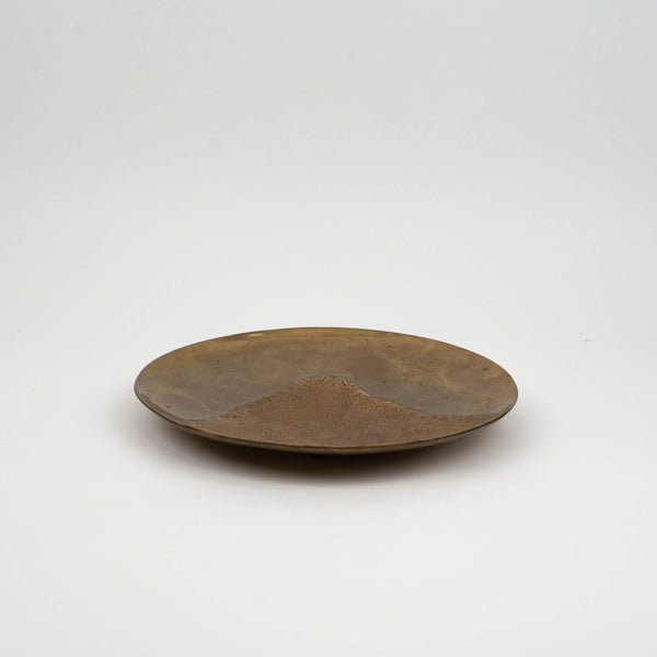 vintage brass bowl with embossed textile relief